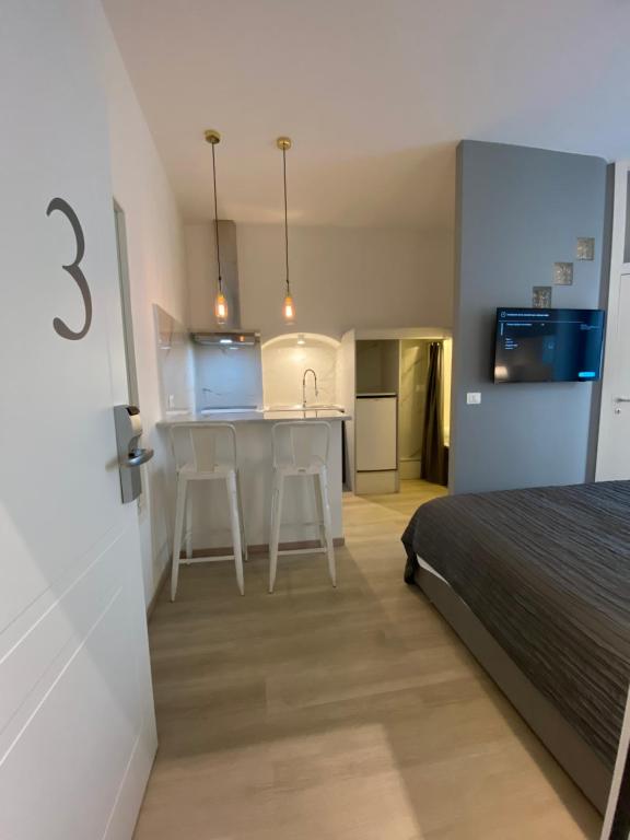 Postel nebo postele na pokoji v ubytování Residenze Romano Ristorante & Spa - albergo diffuso - RED