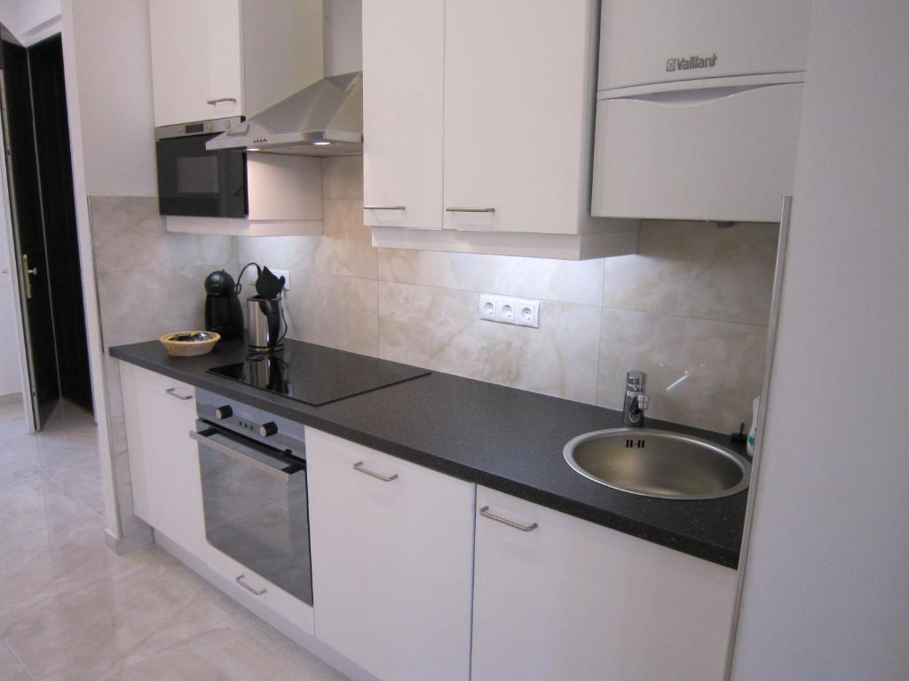 Kuchyň nebo kuchyňský kout v ubytování Apartment Nähe Zentrum