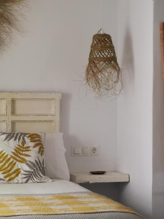 Postel nebo postele na pokoji v ubytování Casa del Sacramento - CASITA CON ENCANTO
