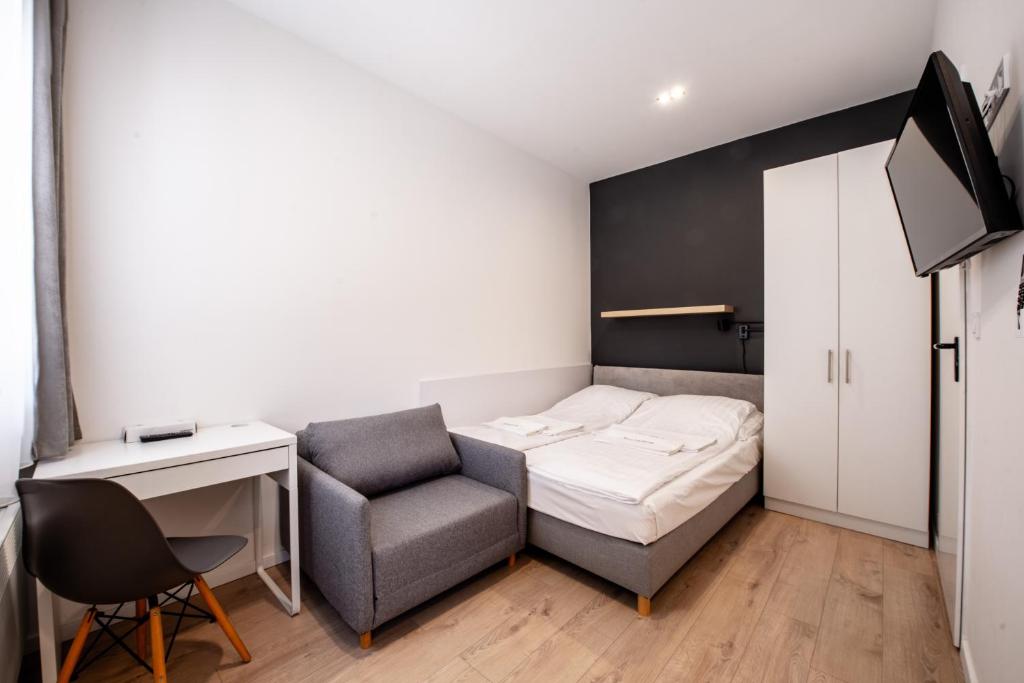 Posteľ alebo postele v izbe v ubytovaní Chesscom Apartments