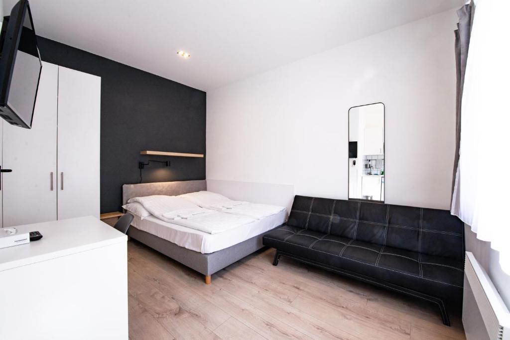 Posteľ alebo postele v izbe v ubytovaní Chesscom Apartments