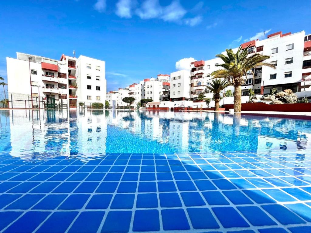 Majoituspaikassa Apartamento Urb. Palmeras del Sur con piscina tai sen lähellä sijaitseva uima-allas