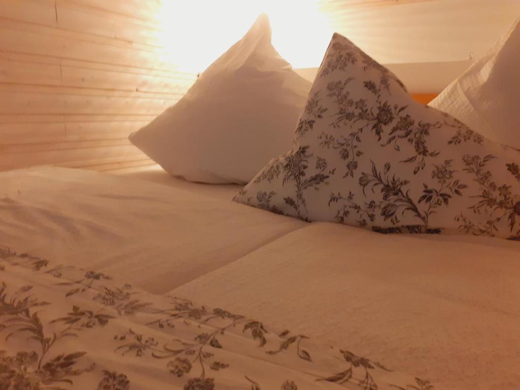 Postel nebo postele na pokoji v ubytování Apartmenthaus AMELIE