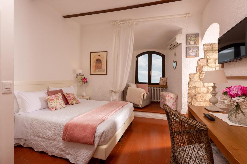 Postel nebo postele na pokoji v ubytování Hotel Ideale
