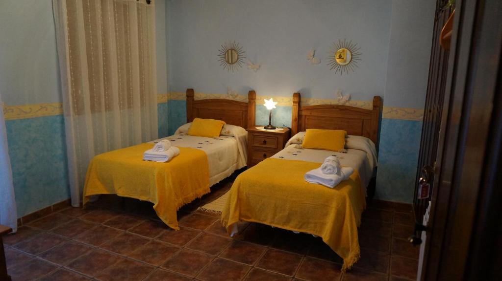 Postel nebo postele na pokoji v ubytování Casa Rural AKIMEQUEDU