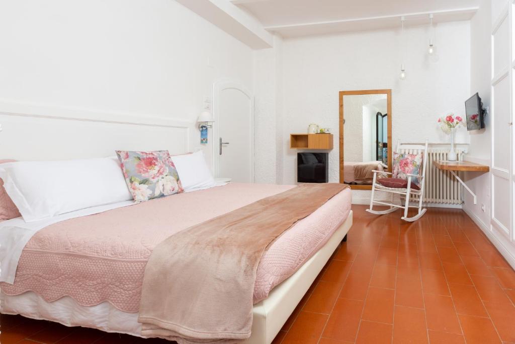 Postel nebo postele na pokoji v ubytování Hotel Ideale