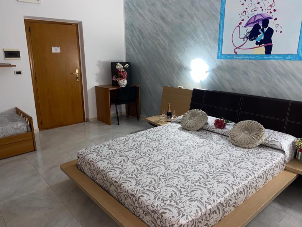 Postel nebo postele na pokoji v ubytování Bed And Breakfast Torretta