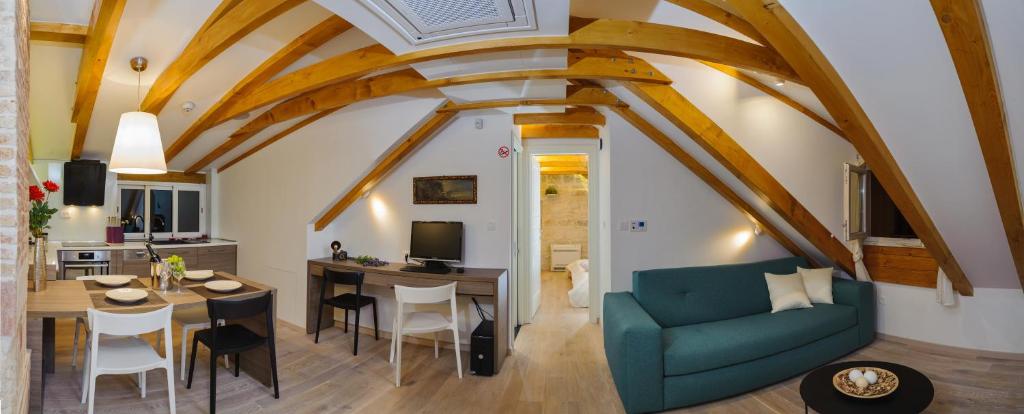 Posezení v ubytování Apartment Atticus
