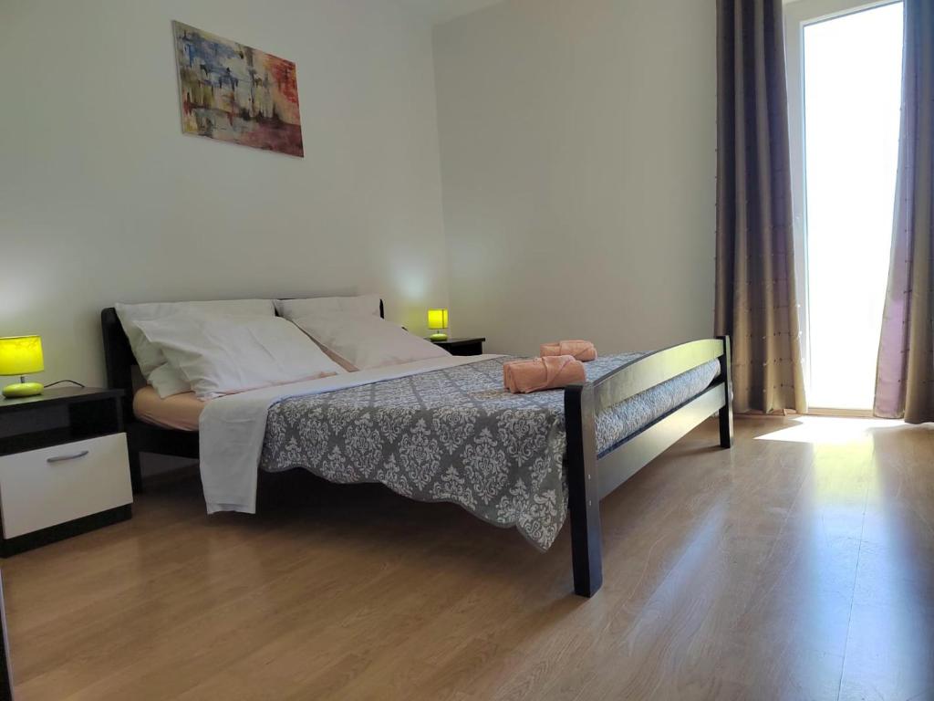 Postel nebo postele na pokoji v ubytování Apartman Memories