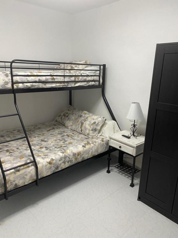 Postel nebo postele na pokoji v ubytování Casa Las Aguilas