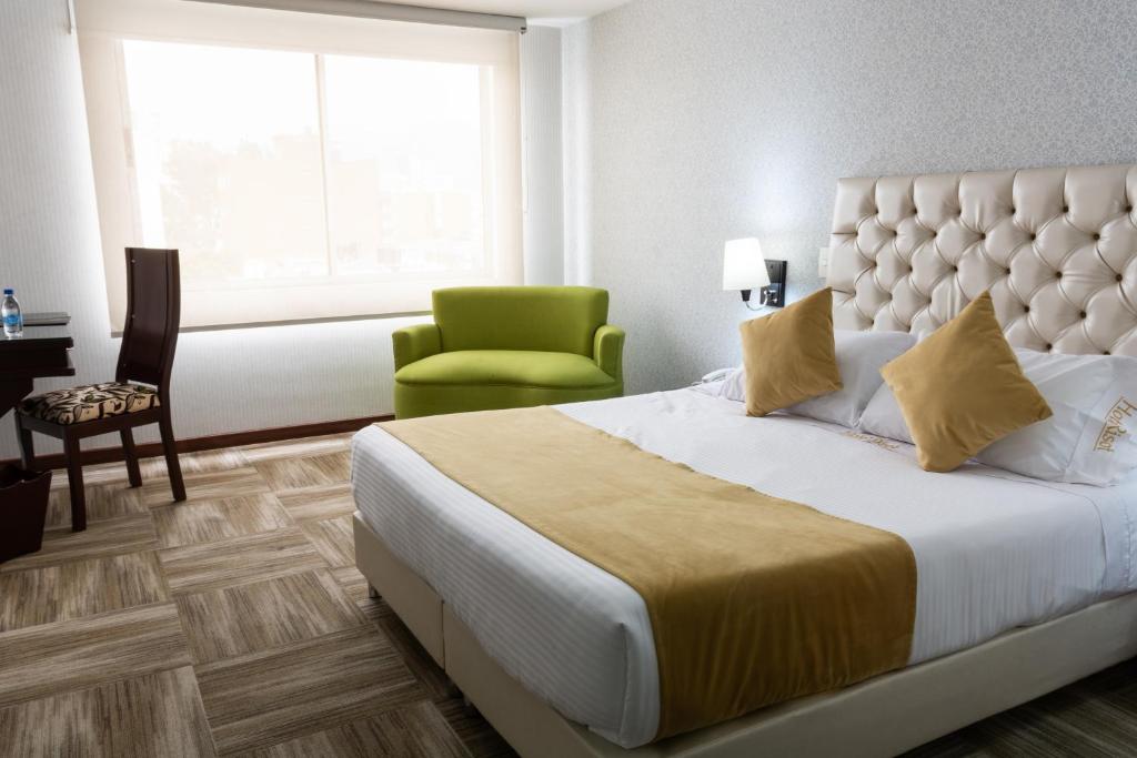 Postel nebo postele na pokoji v ubytování Hotel Risot