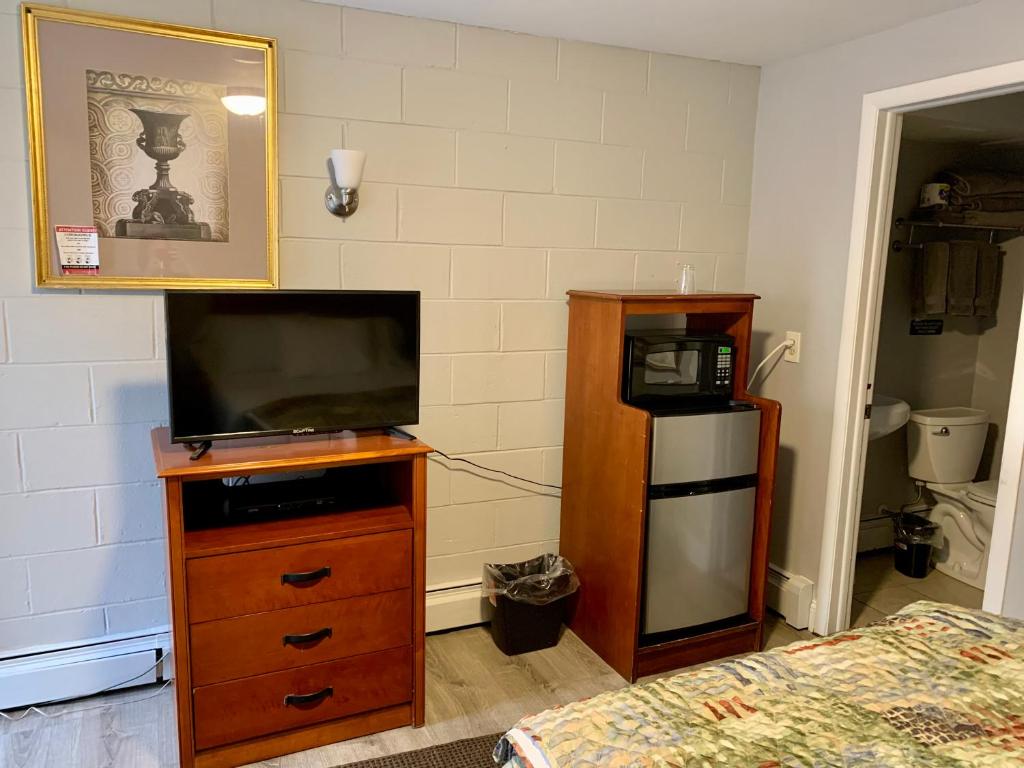 Kuchyň nebo kuchyňský kout v ubytování Hill Top Motel