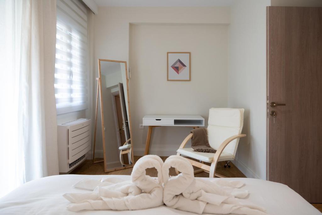 Postel nebo postele na pokoji v ubytování Casa Del Sol Corfu Old Town Apartment