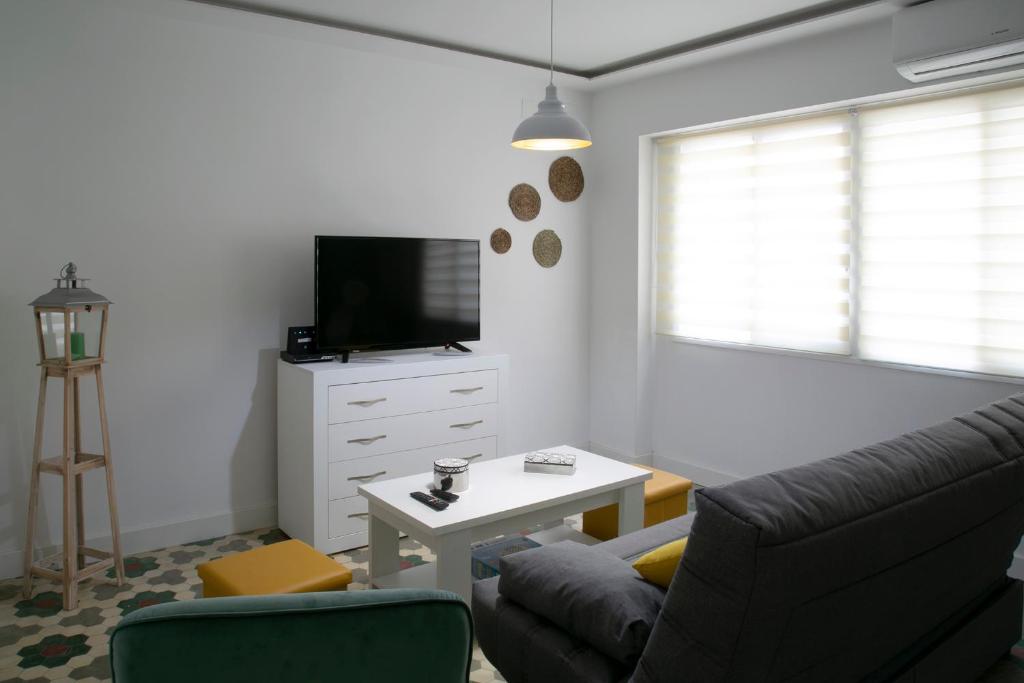Televízia a/alebo spoločenská miestnosť v ubytovaní Apartamento en el centro de Úbeda - Plaza Andalucía