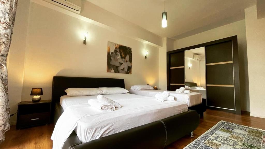 Cama o camas de una habitación en Hotel Ambasador Garden