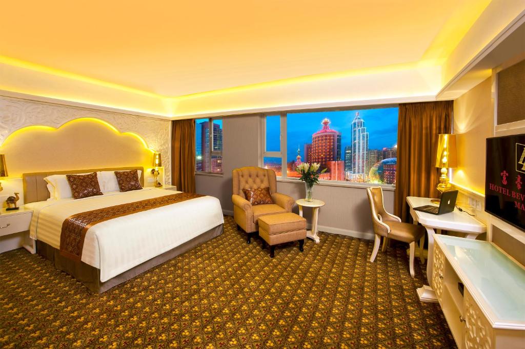 Postel nebo postele na pokoji v ubytování Hotel Beverly Plaza