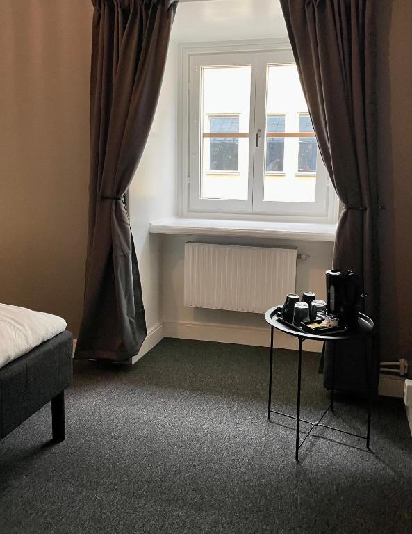 Postel nebo postele na pokoji v ubytování Birka Hotel