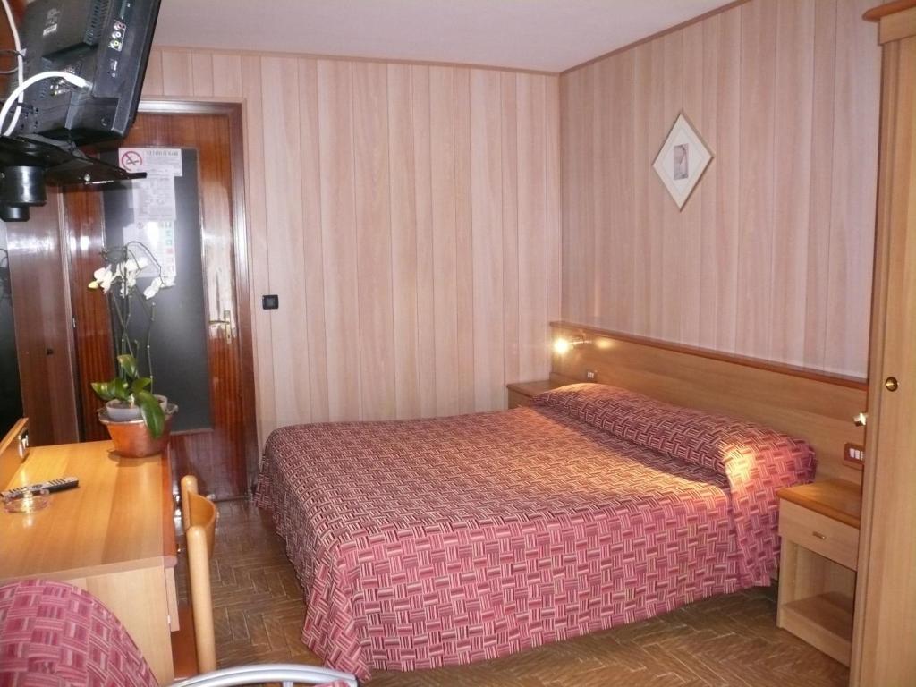 Postel nebo postele na pokoji v ubytování Albergo Panice