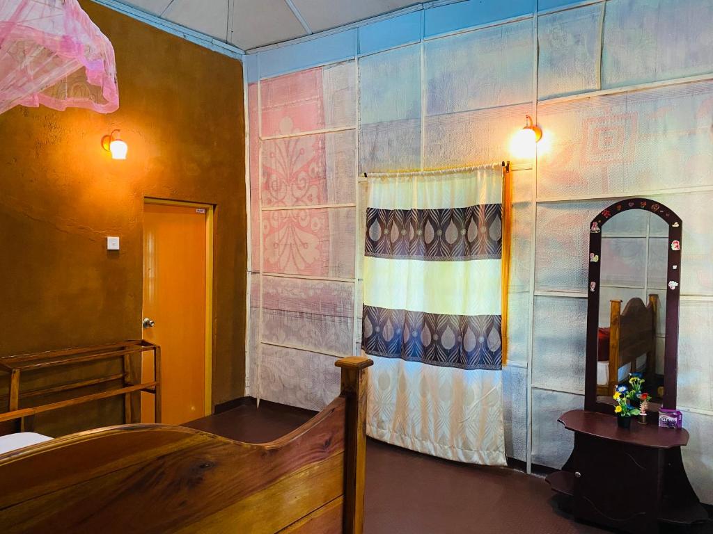 Postel nebo postele na pokoji v ubytování Sigiri Lion Eco Palace