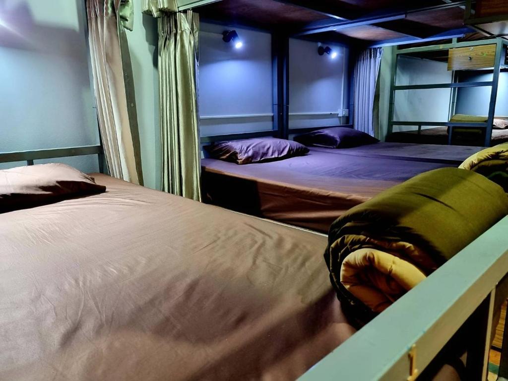 Postel nebo postele na pokoji v ubytování T2B Hostel