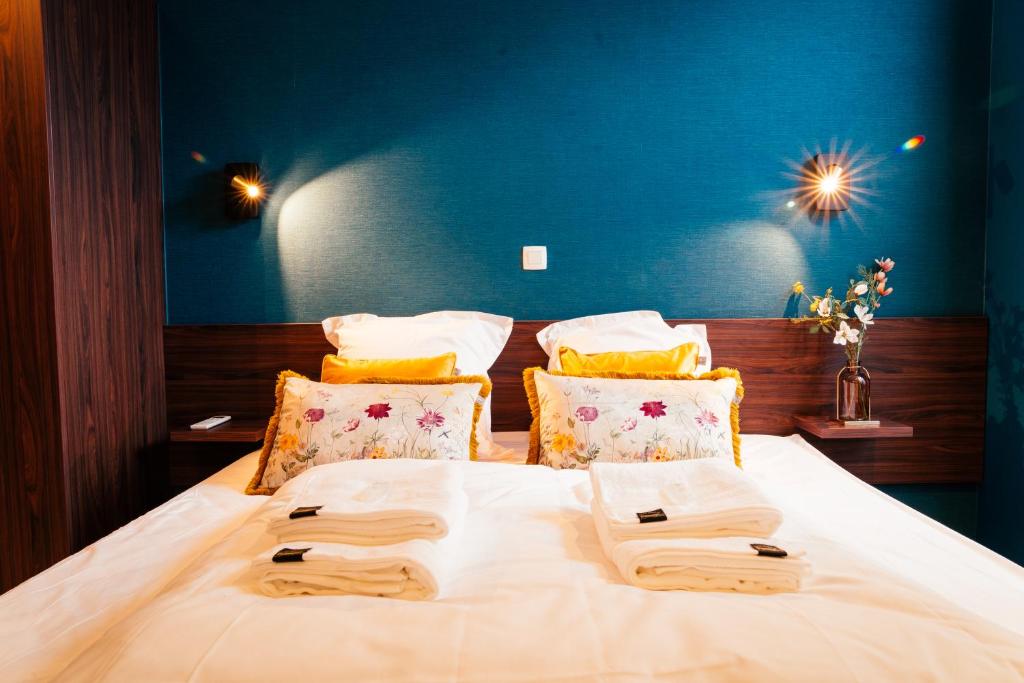 Postel nebo postele na pokoji v ubytování Gran Hotel De Passage