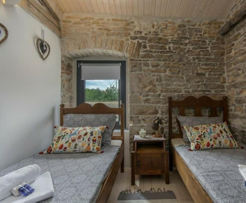 Postel nebo postele na pokoji v ubytování Vila Tilia