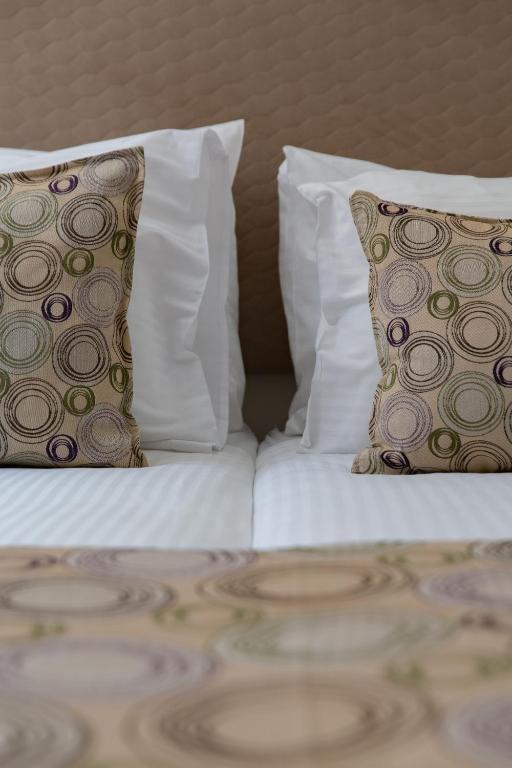 Postel nebo postele na pokoji v ubytování Montefiore Hotel By Smart Hotels