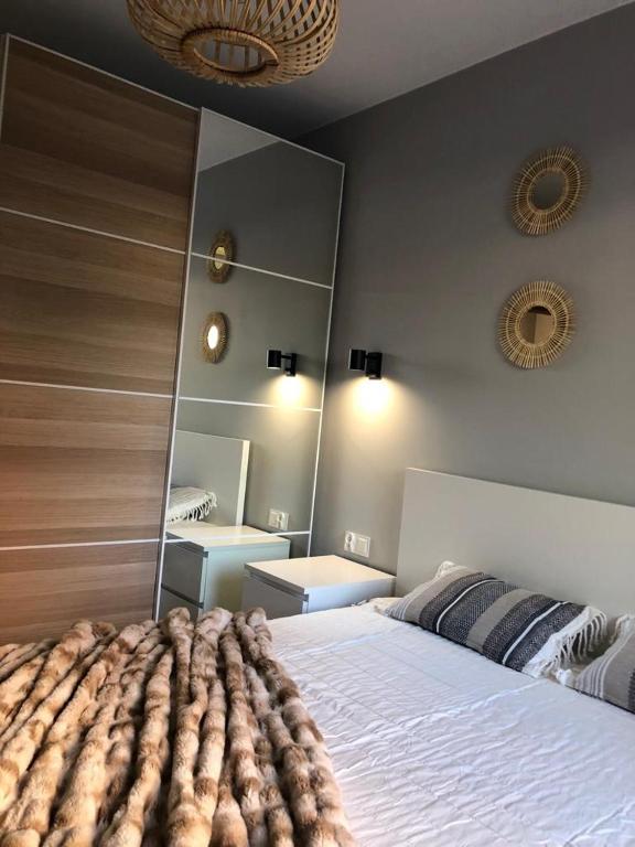 Posteľ alebo postele v izbe v ubytovaní Apartament Silence Stone Hill Przy Skale