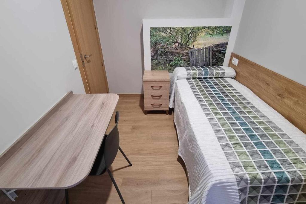 Postel nebo postele na pokoji v ubytování Las tres puertas