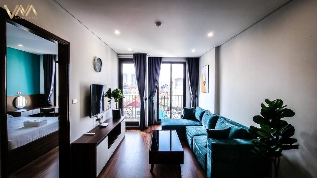 Postel nebo postele na pokoji v ubytování VNAHOMES APARTHOTEL