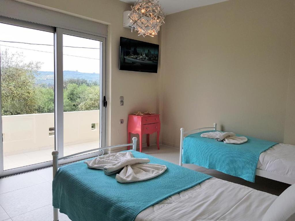 Postel nebo postele na pokoji v ubytování Villa Diktina with private pool sea view