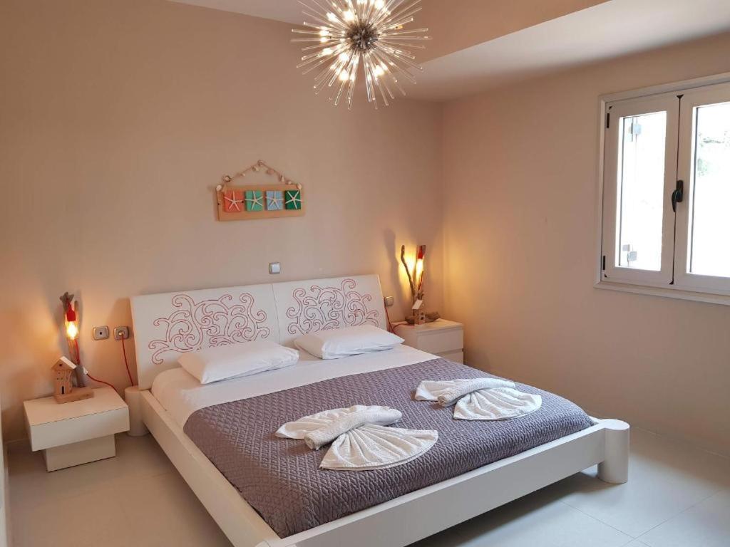 Postel nebo postele na pokoji v ubytování Villa Diktina with private pool sea view