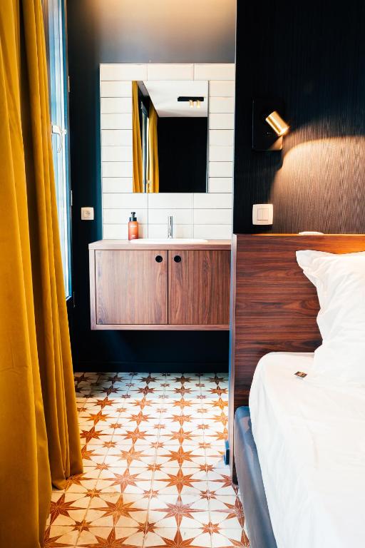 Postel nebo postele na pokoji v ubytování Gran Hotel De Passage