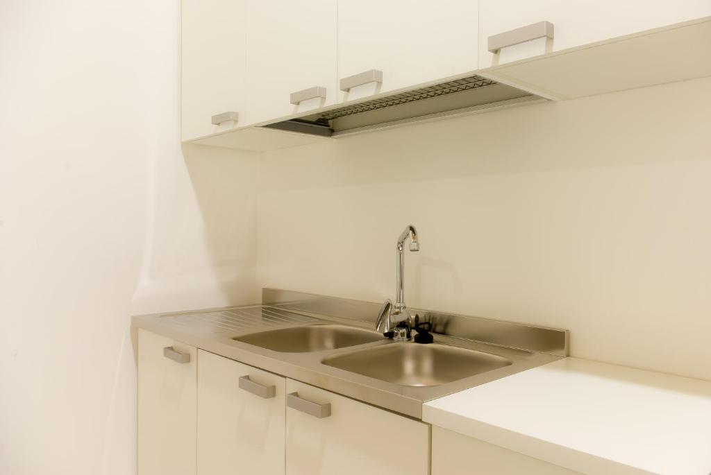 Kuchyň nebo kuchyňský kout v ubytování Residenze Romano Ristorante & SPA albergo diffuso - WHITE