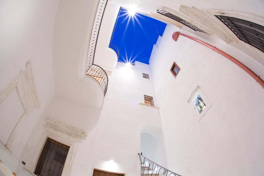 a staircase in a building with a ceiling at B&B Monsignore in Vieste