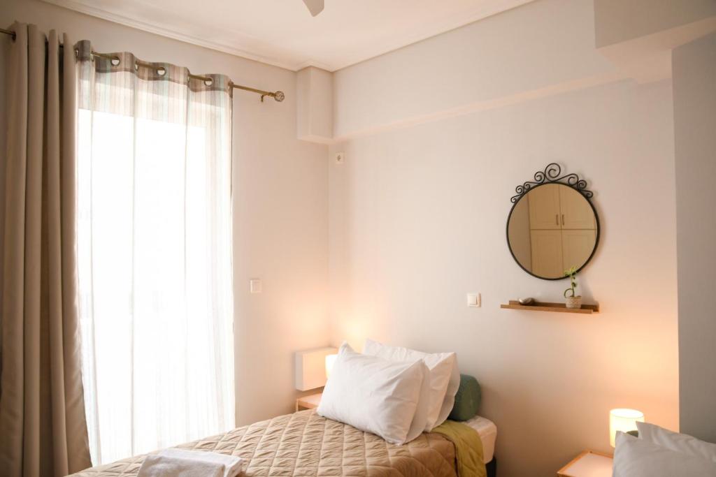 Posteľ alebo postele v izbe v ubytovaní Ageliki's Athens Apartment