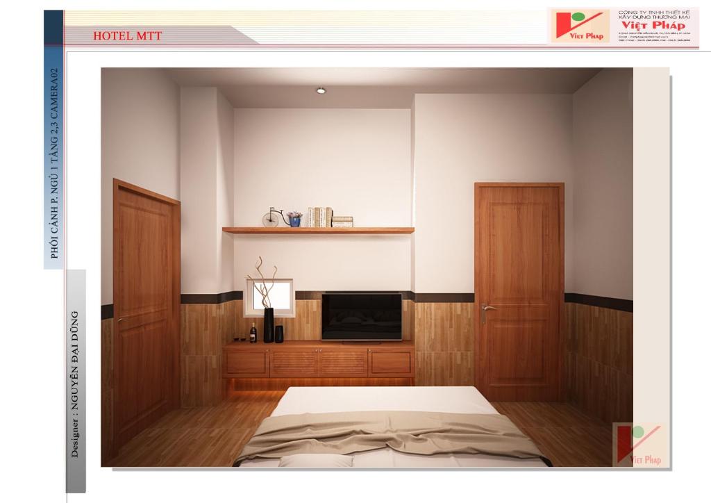 Hotel MTT في مدينة هوشي منه: غرفه فيها سرير وتلفزيون
