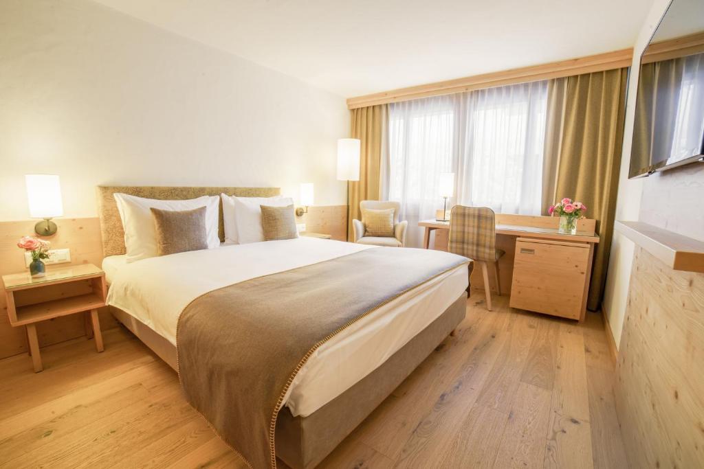 Cama o camas de una habitación en Gstaaderhof - Active & Relax Hotel