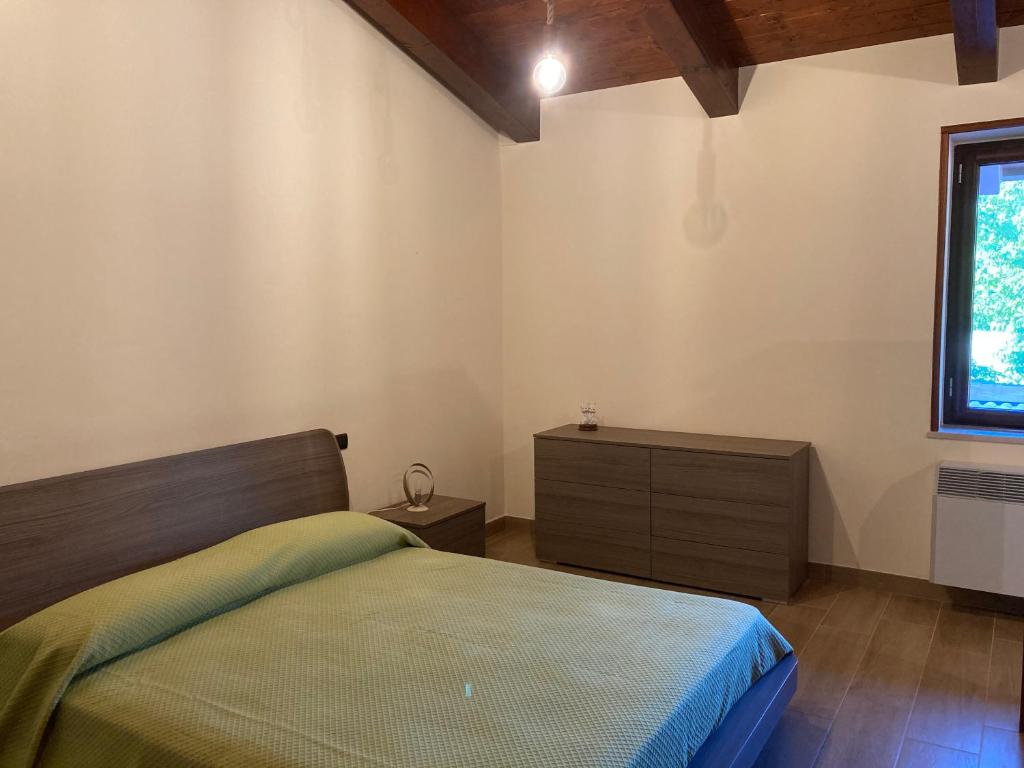 A bed or beds in a room at Masseria Le Zavattole
