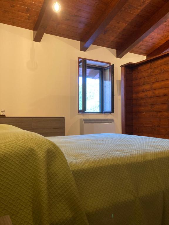 A bed or beds in a room at Masseria Le Zavattole