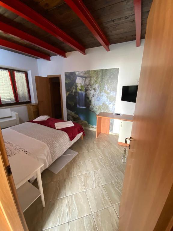 Postel nebo postele na pokoji v ubytování Colle Sul Lago