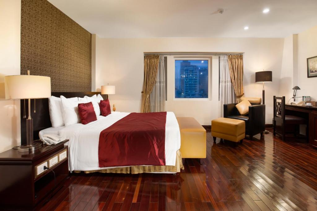 Postel nebo postele na pokoji v ubytování TK123 Hanoi Hotel