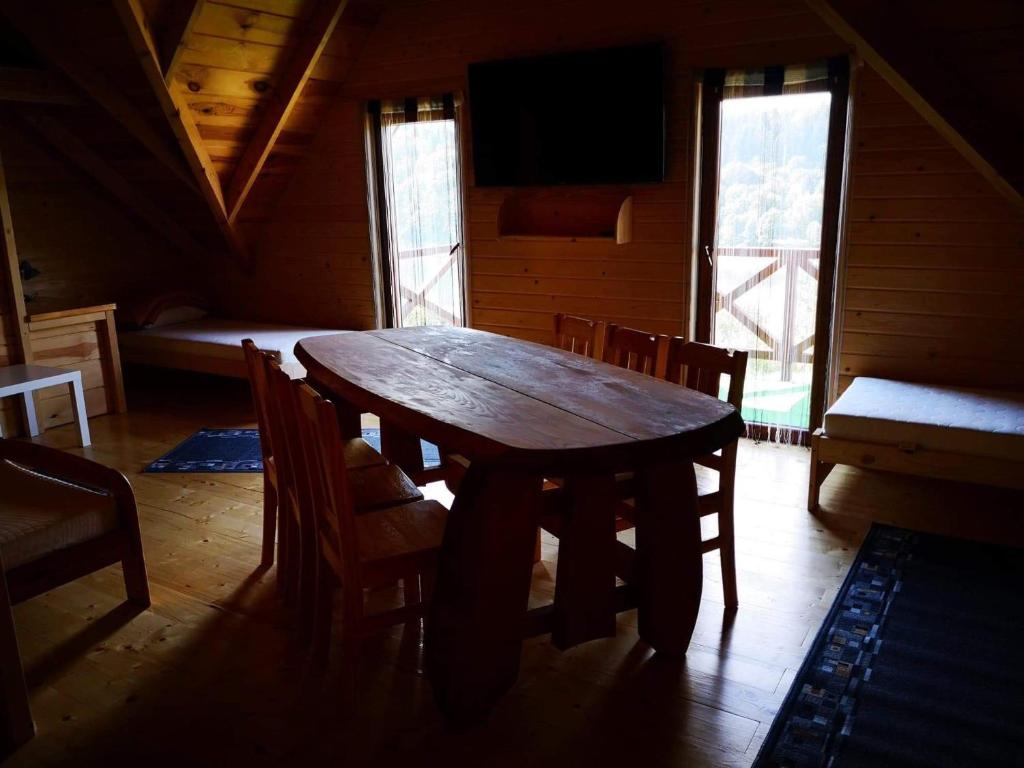 Postel nebo postele na pokoji v ubytování Wataha Zawóz