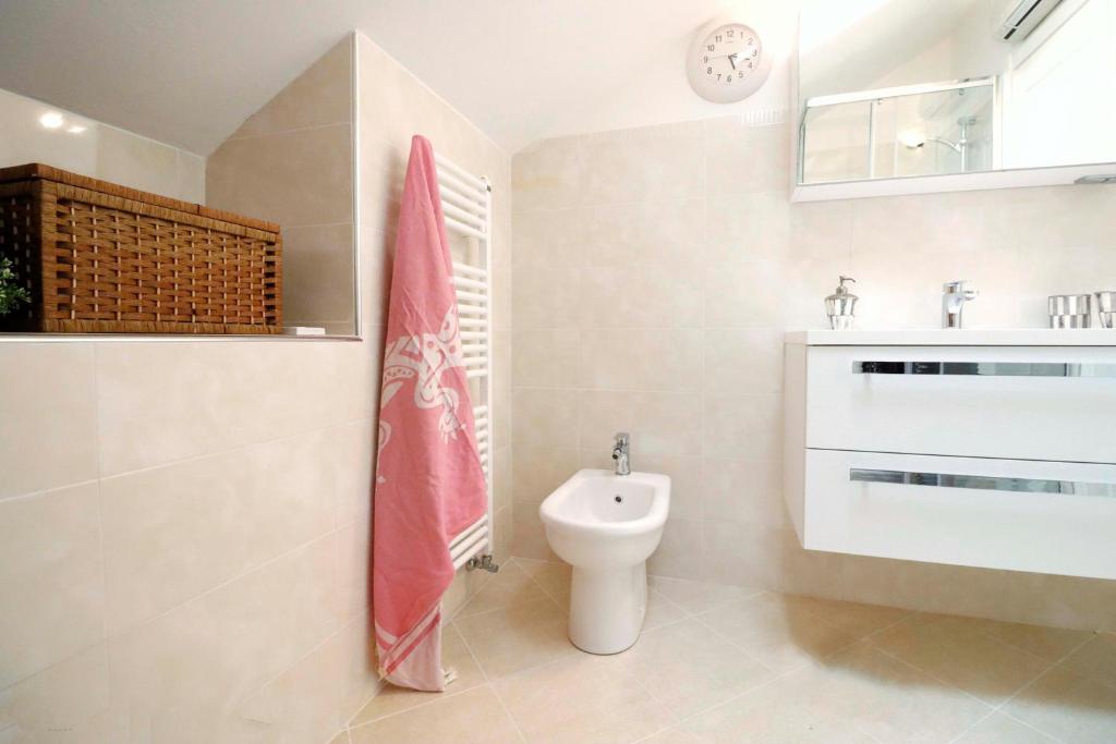 Ванная комната в CasaViva - Central Seaview Penthouse in Camogli