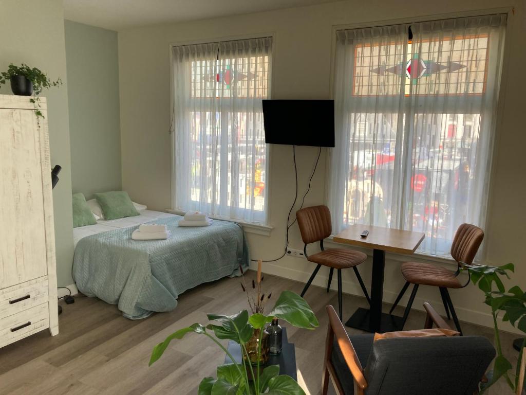 Postel nebo postele na pokoji v ubytování Hotel de Gaaper