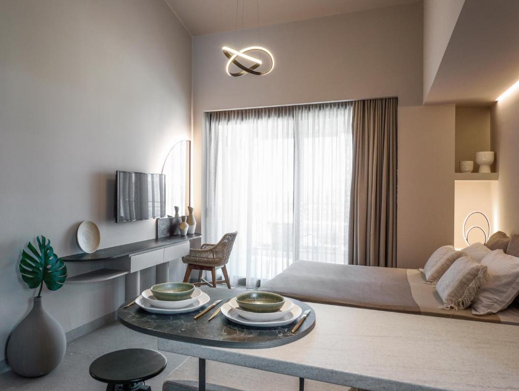 Posteľ alebo postele v izbe v ubytovaní ANASSA BUTIK LIVING NIKITI