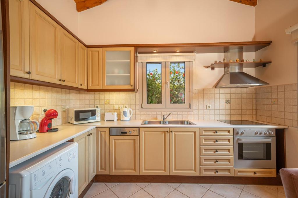Kuchyň nebo kuchyňský kout v ubytování Villa Emily