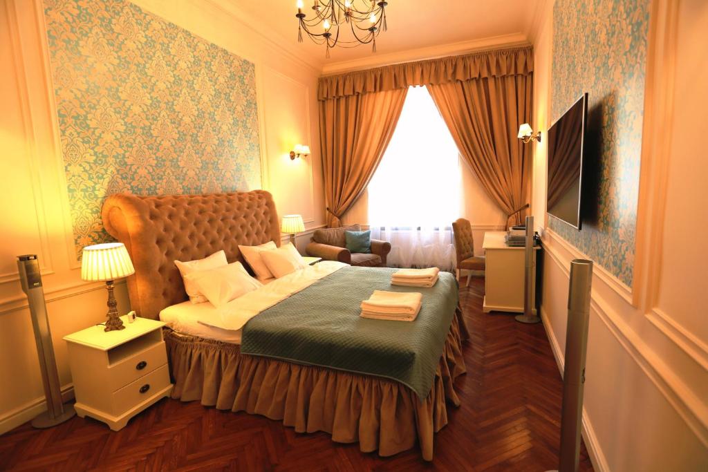 Televízia a/alebo spoločenská miestnosť v ubytovaní Blueberry Apartments