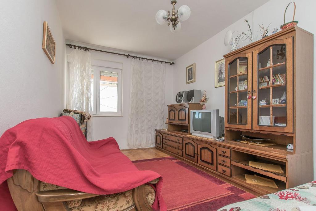 Televízia a/alebo spoločenská miestnosť v ubytovaní Apartment Sladana
