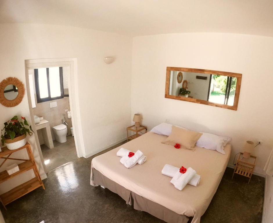 Postel nebo postele na pokoji v ubytování MAYANA SICILY - The suites